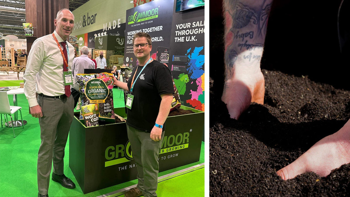 Two men at the Gro Worm stand at Glee Birmingham beside a close-up of hands in dark peat-free compost